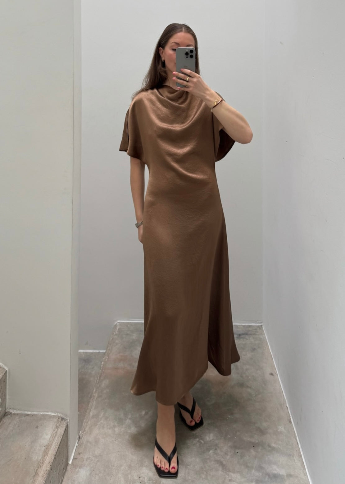 brown satin long draped dress by noted antwerp