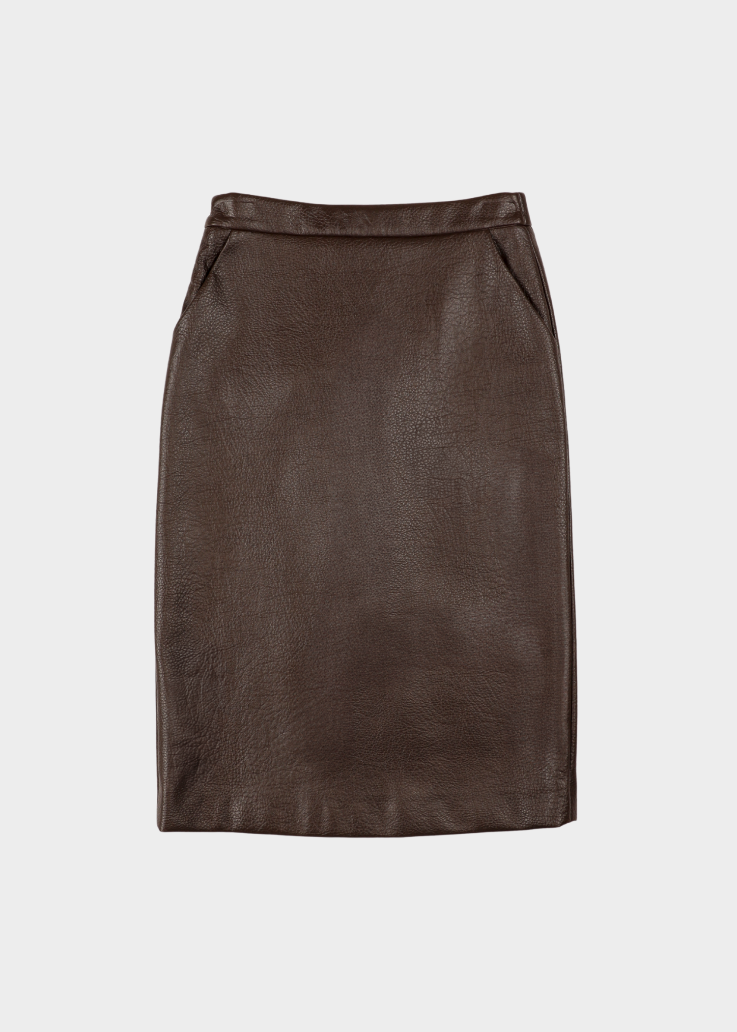 NOTED Dula skirtA dark brown faux-leather pencil skirt with a structured waistband and side seam detailing, shown flat against a light gray background.