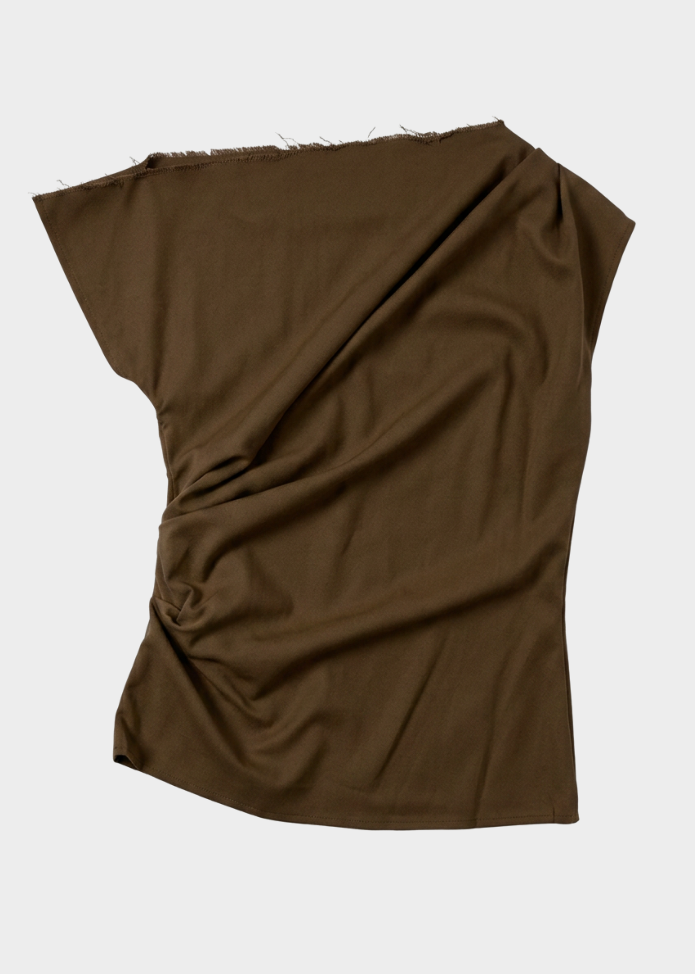 A draped piece of solid brown fabric with a frayed edge, arranged on a light gray background.