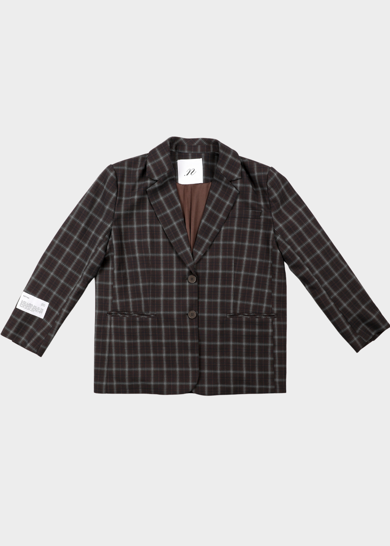NOTED Antwerp, Carli blazer checkered. dark brown and black plaid blazer jacket with a brown lining, displayed flat against a light gray background.